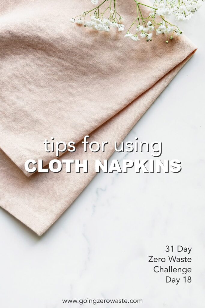 Reusable napkins and babies breath flowers with overlay text reading "tips for using cloth napkins" 