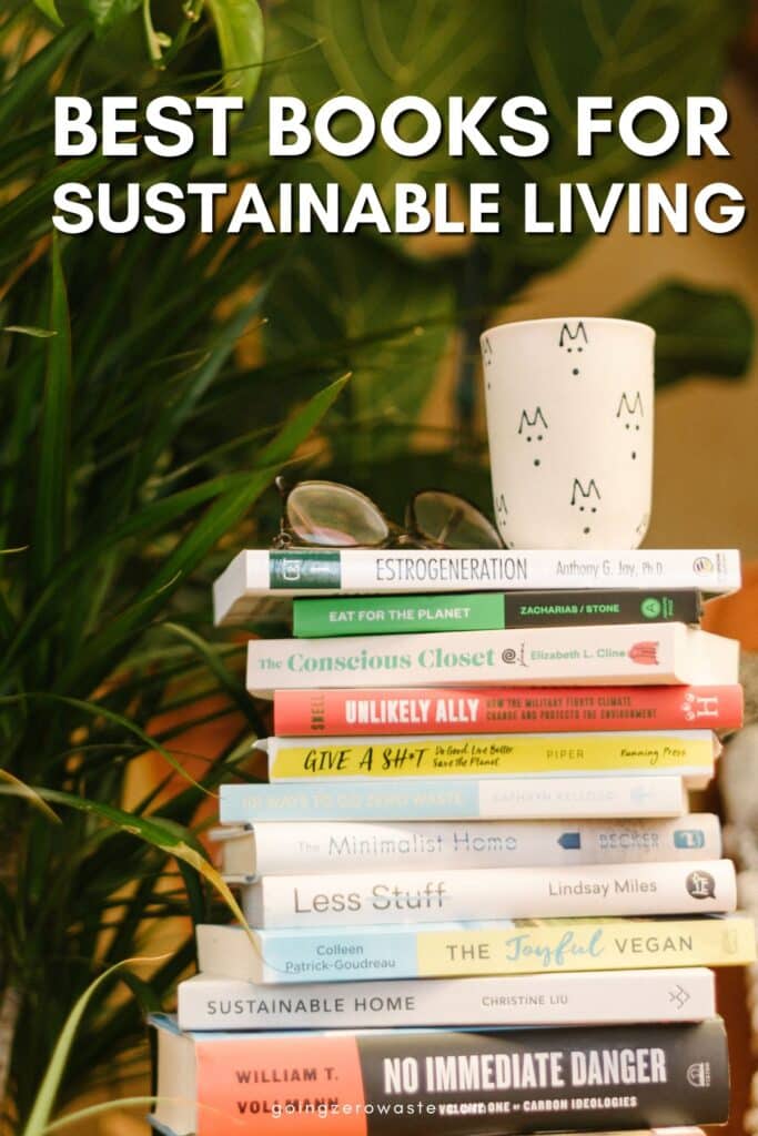 Stack of sustainable books with a coffee mug and reading glasses on top, with overlay text reading "best books for eco-friendly and sustainable living"