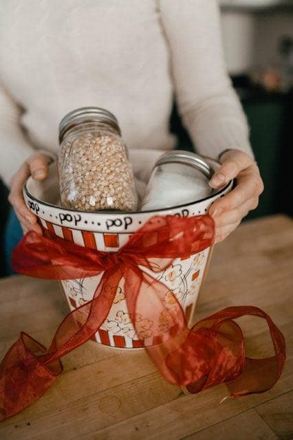 popcorn bucket with gifts inside
