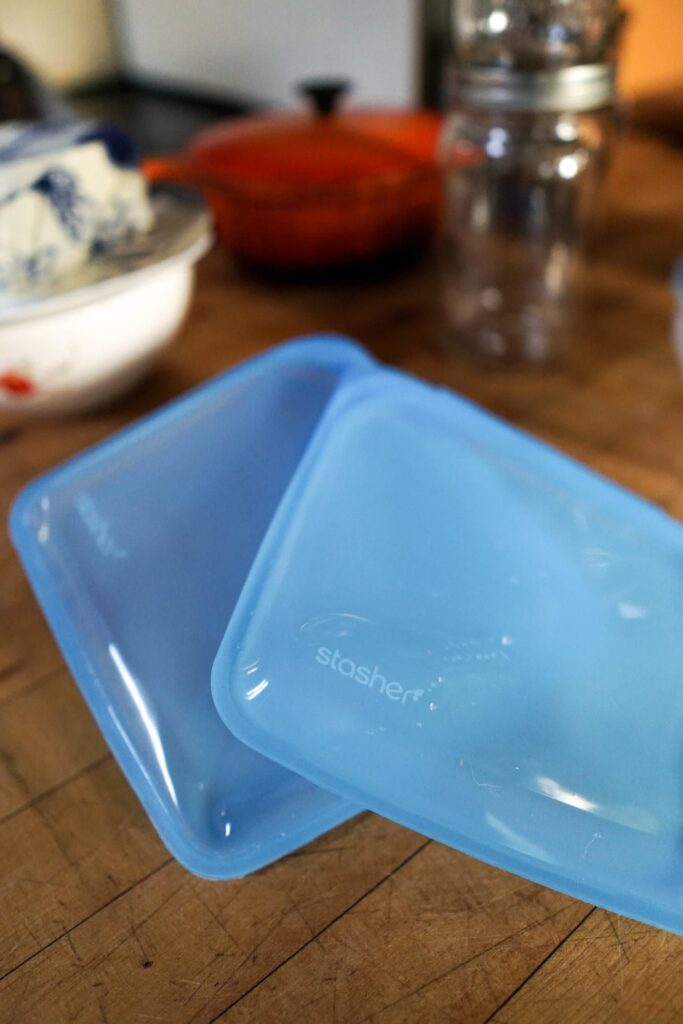 Stasher bags on a counter as part of this kitchen essentials list.