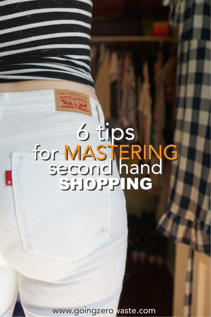 Picture of the back of a woman's hip wearing white Levi jeans with overlay text reading "6 tips for mastering secondhand shopping" 