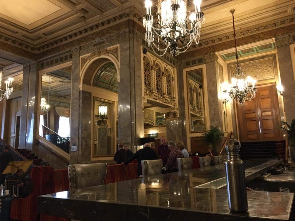 Photo of the Sir Francis Drake hotel with a Kleen Canteen on the counter for a fun, sustainable party decor on the go.